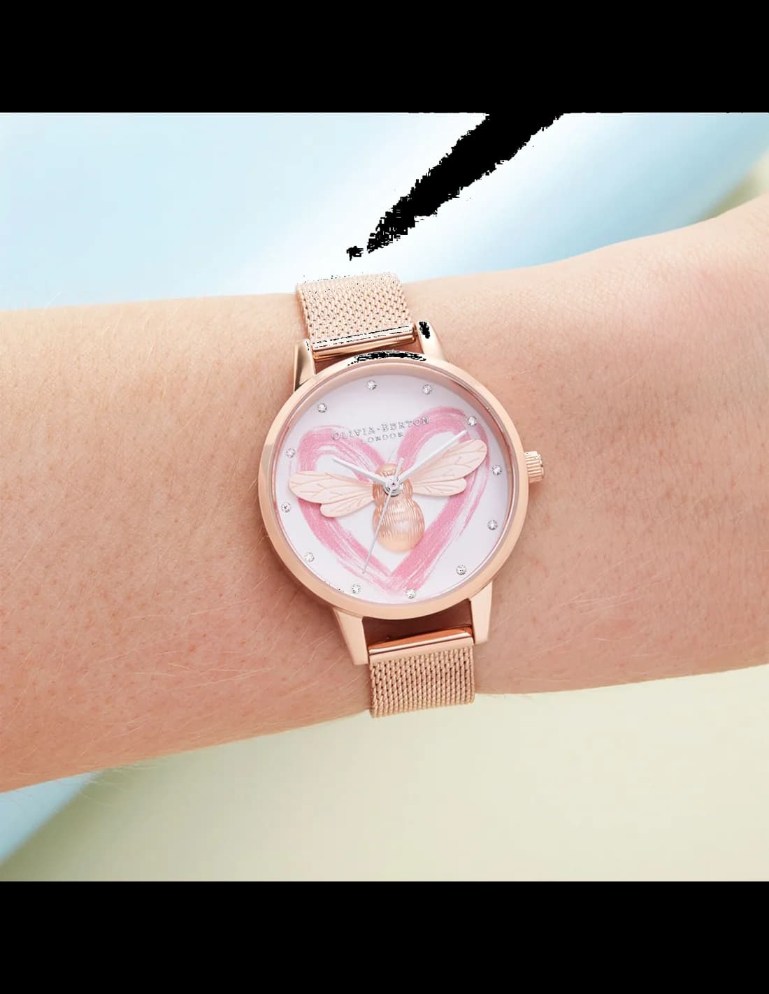 Montre Olivia Burton Lucky Bee cadran blanc gros plan cœur logo abeille 30mm