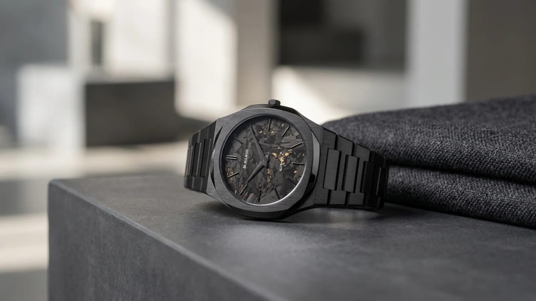 D1 Milano Ultra Thin watch with octagonal case laid on grey stone, Milanese editorial atmosphere