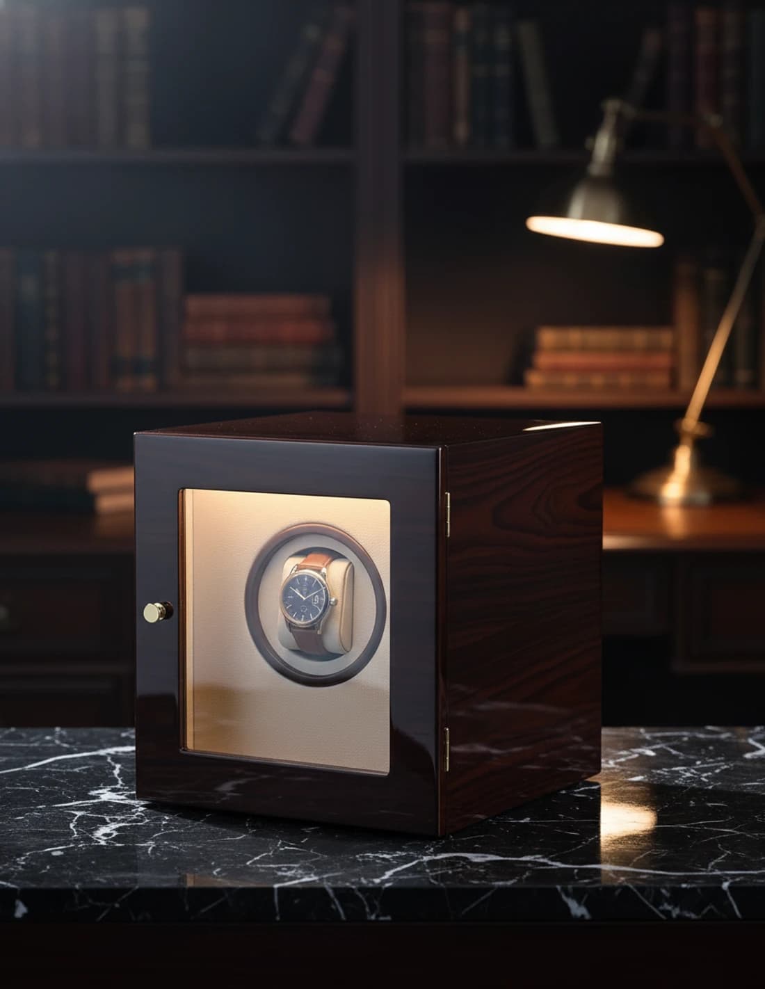 Automatic watch winder on black marble, library setting