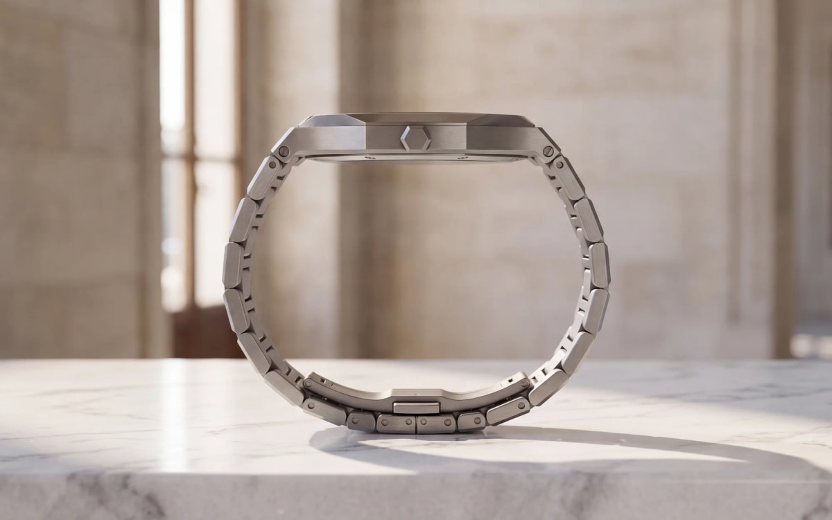Side view of a steel D1 Milano Ultra Thin on marble: 6 mm case and hexagonal crown