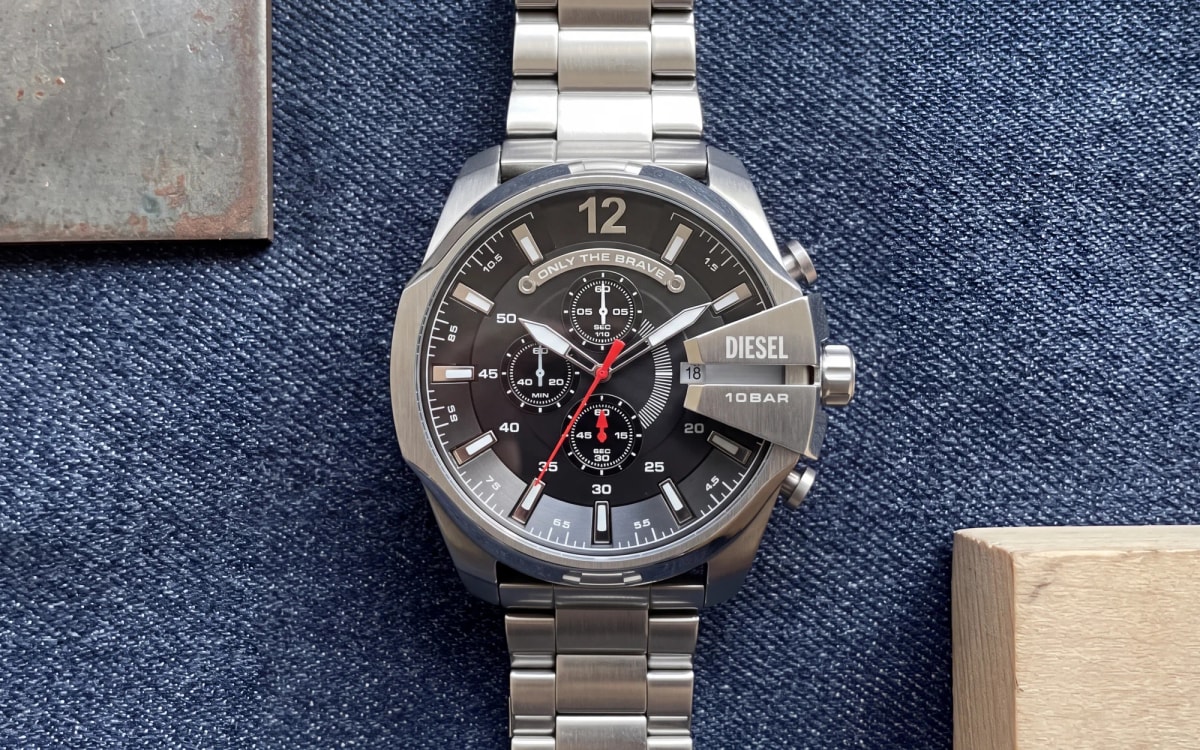 Diesel Mega Chief DZ4308 steel chronograph with black dial and red seconds hand on raw indigo denim