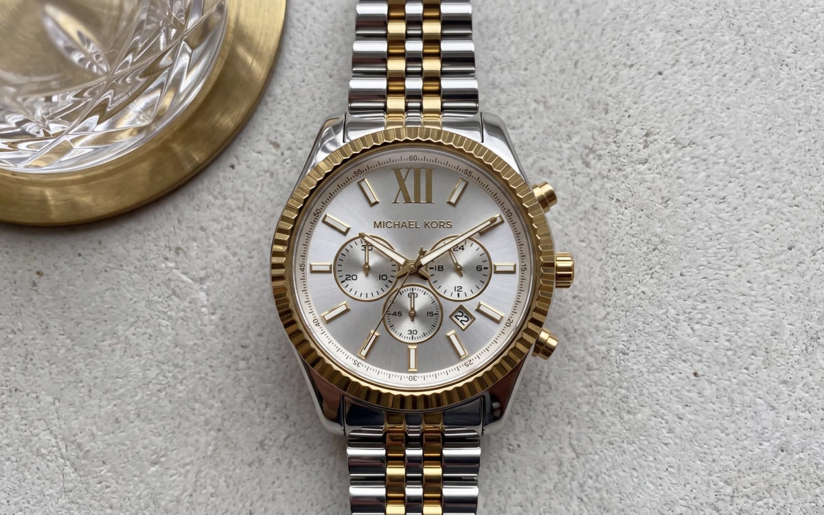 Montre homme Michael Kors Lexington MK8344 bicolore acier et or, chronographe posé sur pierre grise