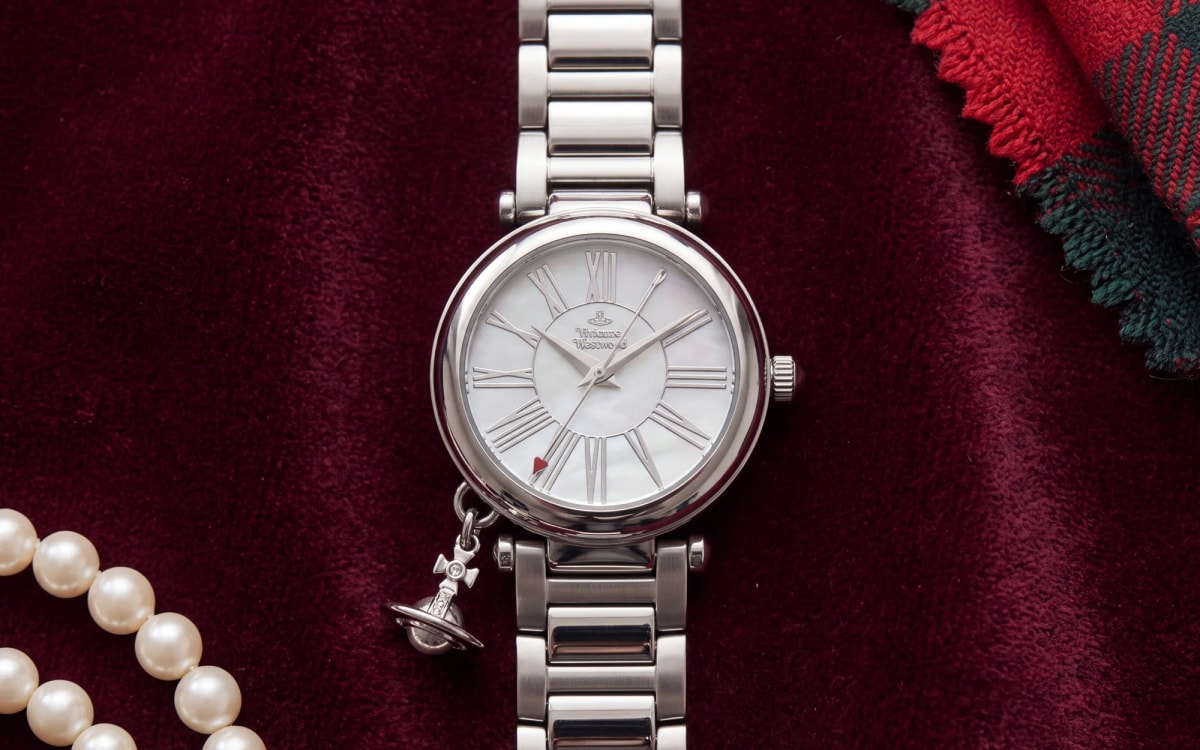 Vivienne Westwood Orb VV006PSLSL women's steel watch, mother-of-pearl dial and orb charm, on burgundy velvet